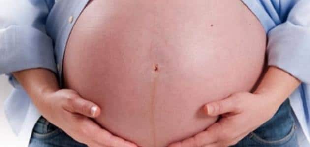متى يكبر ويظهر بطن الحامل في اي شهر؟