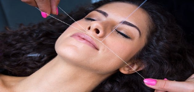 إزالة شعر الوجه بالخيط
